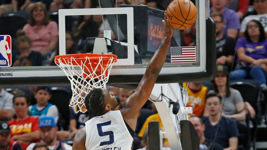 Utah Jazz's Jarrell Brantley (5) blocks the shot of Memphis Grizzlies' Dusty Hannahs (8) during the second half of an NBA summer league basketball game Monday, July 1, 2019, in Salt Lake City. (AP Photo/Rick Bowmer)