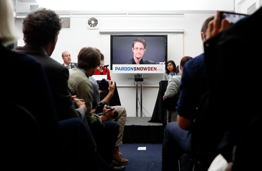 (Mary Altaffr | AP file photo) Edward Snowden is seen on a television screen via video uplink from Moscow during a news conference to call upon President Barack Obama to pardon Snowden before he leaves office in New York, Sept. 14, 2016. Snowden, a former intelligence contractor, leaked files on massive government surveillance and would almost surely face prosecution if he returned to the U.S.