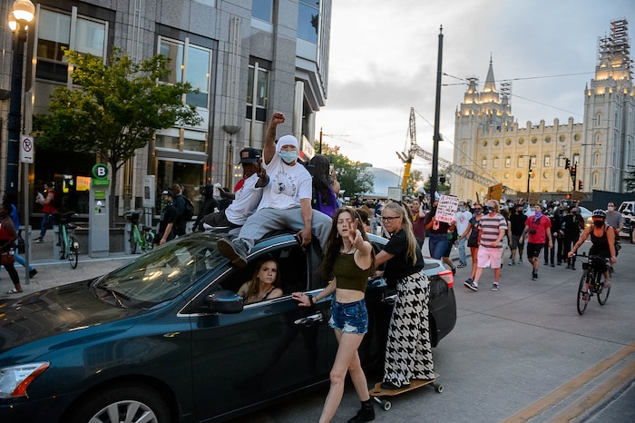 (Trent Nelson  |  The Salt Lake Tribune) Protesters march through Salt Lake City on Monday, June 1, 2020.