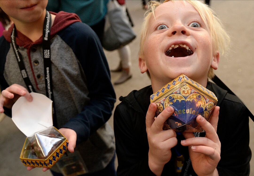 (Al Hartmann  |  The Salt Lake Tribune) 	Young wizard Charlie Woolenzien, 7, is excited to finds a box of "chocolate frogs" at Warner Bros. Harry Potter-themed exhibit and shopping area in the Shops at South Town in Sandy. There are interactive activities in addition to "Harry Potter" and  "Fantastic Beasts and Where to Find Them" merchandise. 
