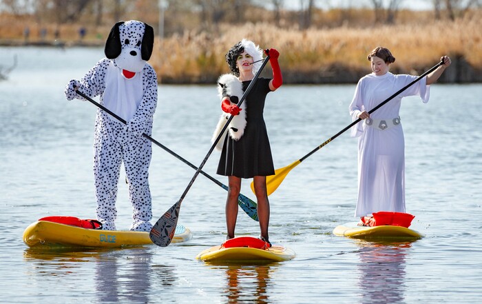 (Francisco Kjolseth  |  The Salt Lake Tribune) Chris Knoles, Roxy Christensen and Miranda Lavallee, from left, put their Halloween spirit on the water as they paddle board at Bountiful Pond on Oct. 31, 2020, in what has become a yearly tradition.