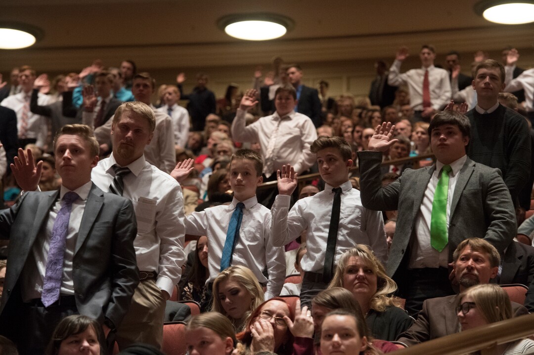 (Rick Egan  |  The Salt Lake Tribune)         LDS Aaronic priesthood members, stand to sustain President Russell M. Nelson and the first presidency of the church, during a  Solemn Assembly in the Saturday morning session of the 188th Annual General Conference in Salt Lake City,  Saturday, March 31, 2018.