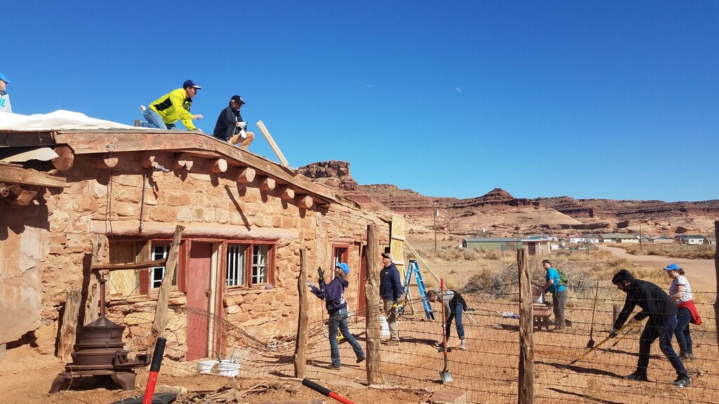 (Josh Loftin | Utah Department of Cultural and Community Engagement) Local volunteers, students and staff from Utah State University Eastern working on the Oljato Trading Post in March 2020.