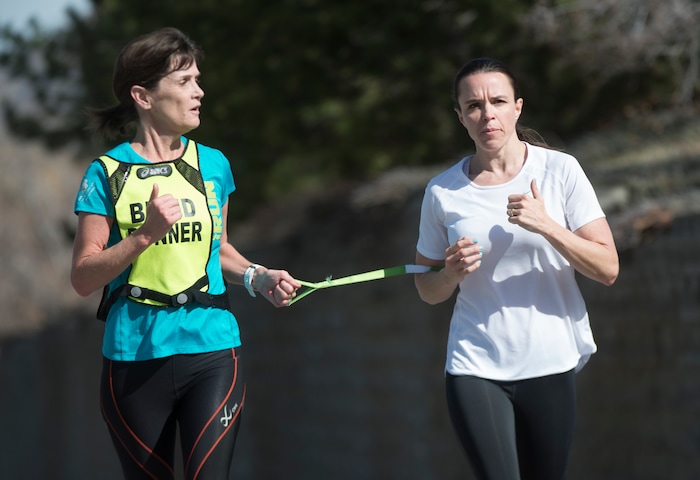 (Rick Egan  |  The Salt Lake Tribune) . Becky Andrews and Alanna Whetsel train for the Boston Marathon by running along David Boulevard in Bountiful, Thursday, March 29, 2018.