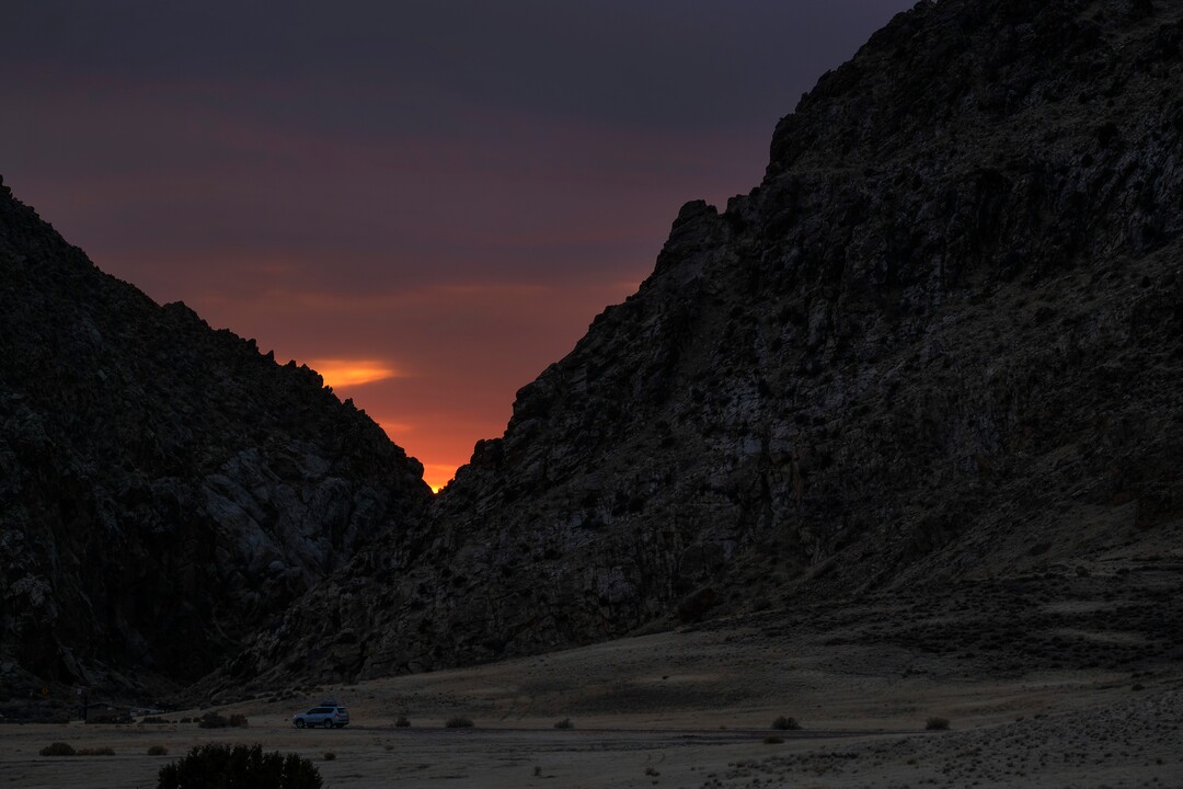 (Leah Hogsten | The Salt Lake Tribune)  The sun is shown setting within the vee of the Parowan Gap, a day prior to the spring equinox observance, Saturday, Mar. 19, 2021.