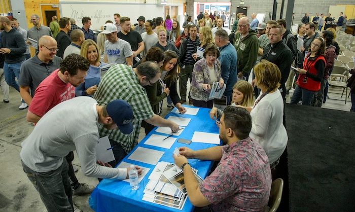 (Steve Griffin  |  The Salt Lake Tribune)  Access Development employees get food truck lunch tickets, on the company,  after attending an open enrollment benefits meeting at the South Salt Lake company on Nov. 16, 2017.