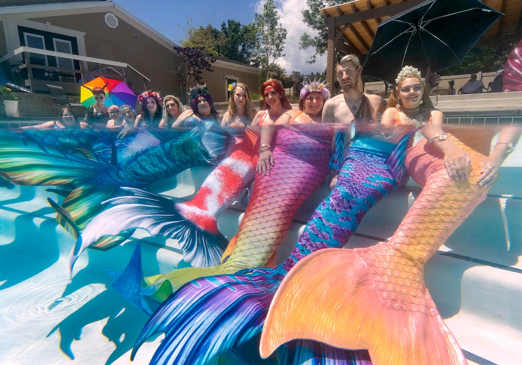 (Francisco Kjolseth | The Salt Lake Tribune) The Mermaids of The Great Salt Lake, a group of entertainers and performers, gather for a photo on Saturday, June 24, 2023, to talk about their pod. From left, Tori Allen, Bradie Anderson, Karma Stowe, Nancy Doxtator, Gabrielle Nichols, Tracey Sermon, Angie Braithwaite, Holly Lancaster, Jodi Bingham, Savannah Nystrom, Drake Kunz, and Mika Johnston do most of their work “dry” but relish the opportunity to get their tails wet. 