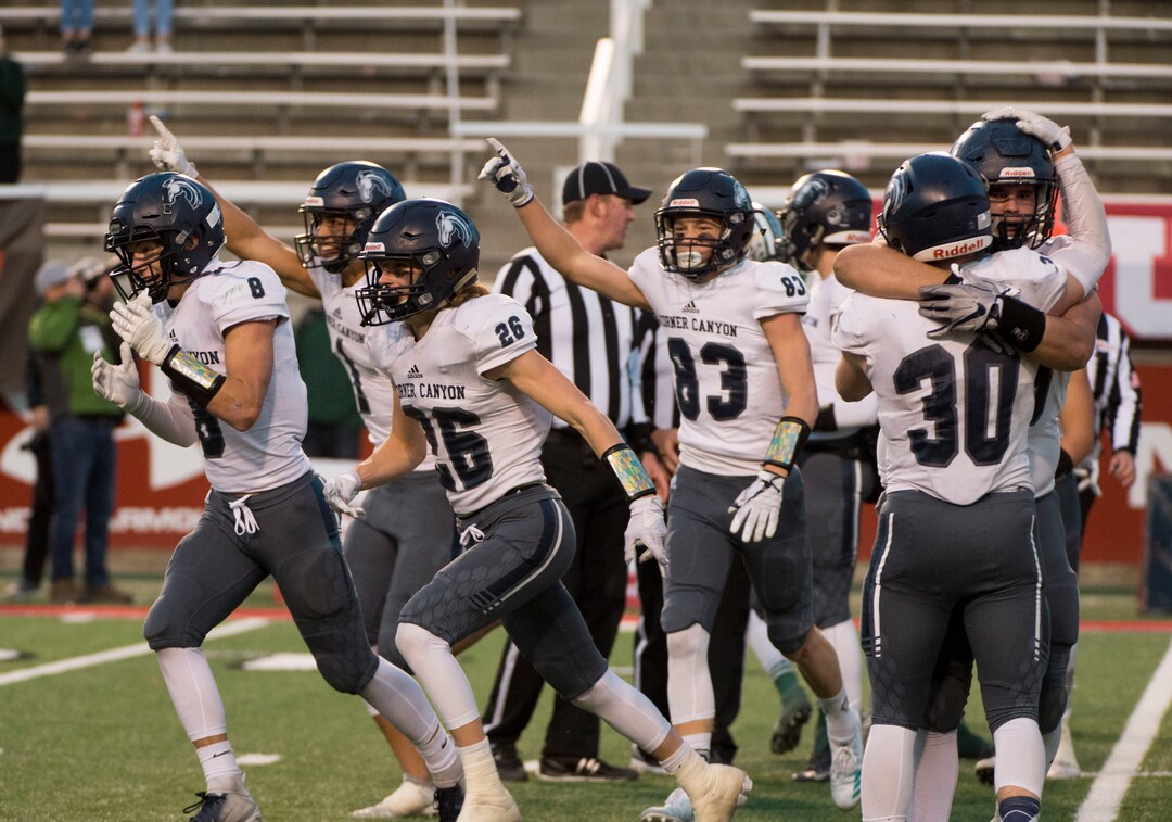 (Rick Egan  |  The Salt Lake Tribune)     Corner Canyon celebrates their win over  the Titans, in 5A football semifinal action between Olympus and Corner Canyon at Rice-Eccles Stadium, Thursday, Nov. 8, 2018.
