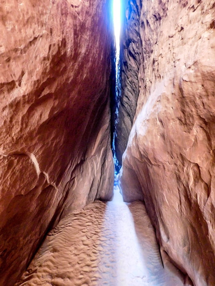 (Erin Alberty|The Salt Lake Tribune) The walls of Leprechaun Canyon allow a narrow strip of light to reach the canyon floor on April 29, 2017.