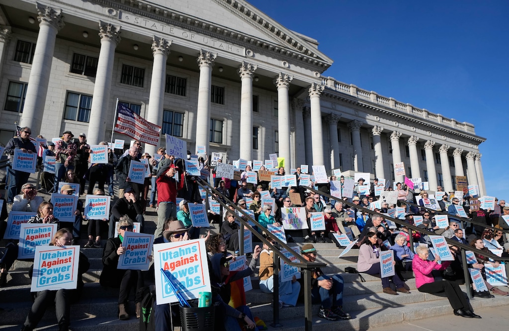 (Francisco Kjolseth | The Salt Lake Tribune) People gather on the steps of the Utah Capitol for the Let Utah Voter Rally on Monday, March 10, 2025, protesting changes that they said will make it harder for Utahns to make their voices heard. Bills passed this session would require voters to opt-in to mail-in balloting after the 2028 election; require ballot initiatives that would raise taxes to get 60% support from voters and backers of ballot initiatives to pay $1.4 million to publish initiative text in newspapers; and would let the governor appoint the chief justice of the Utah Supreme Court.