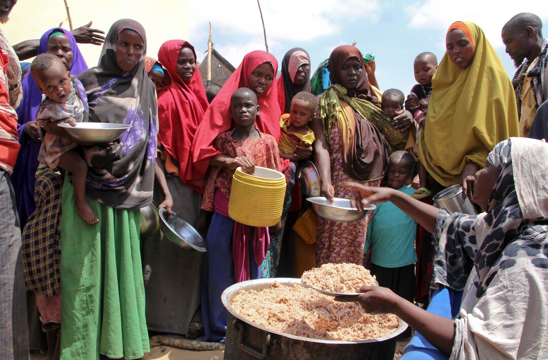 (Farah Abdi Warsameh  |  AP Photo)  Newly arrived Somalis, displaced by the drought, receive food distributions at makeshift camps in the Tabelaha area on the outskirts of Mogadishu, Somalia Thursday, March 30, 2017. Somalia's current drought is threatening half of the country's population, or about 6 million people, and is joined by similar hunger crises in South Sudan, northeastern Nigeria and Yemen, which together make up what the United Nations calls the world's largest humanitarian disaster in more than 70 years.