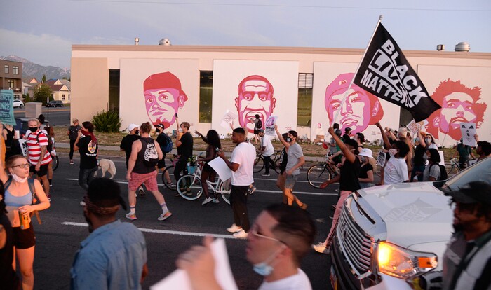 (Francisco Kjolseth  |  The Salt Lake Tribune) Protesters march the streets of downtown Salt Lake City as they congregate at 800 South, 300 West by the mural of George Floyd and other people killed in Utah by police as they rally against police brutality on Friday, June 26, 2020.
