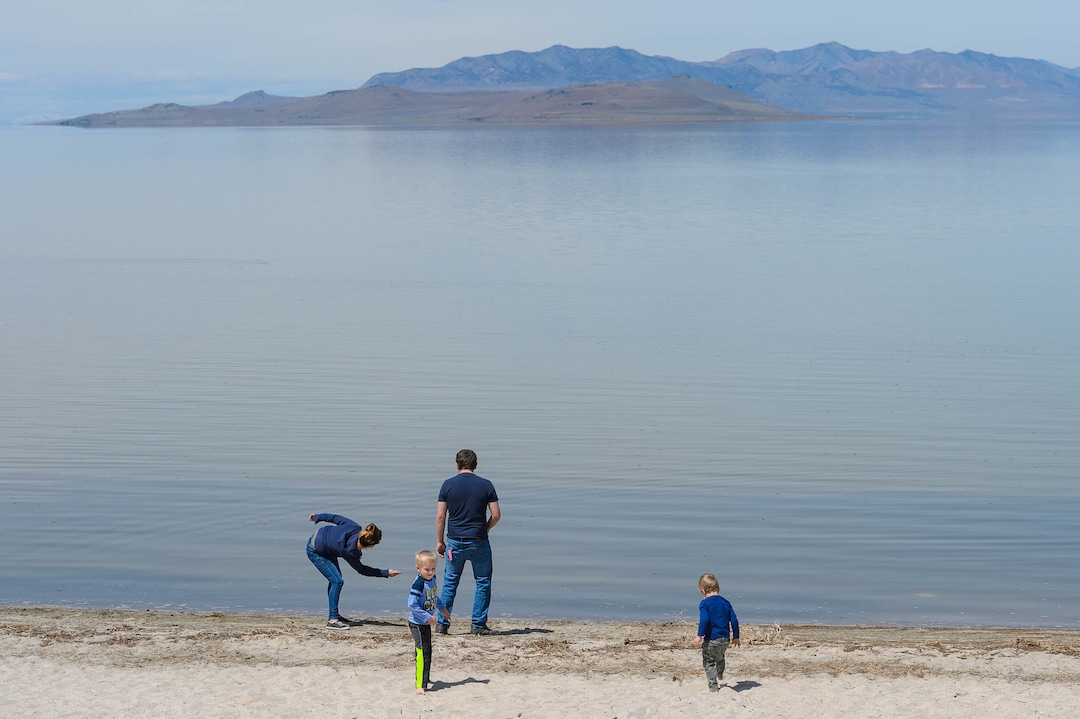 (Trent Nelson  |  The Salt Lake Tribune) A family skips rocks at Antelope Island State Park, on Saturday, April 25, 2020.