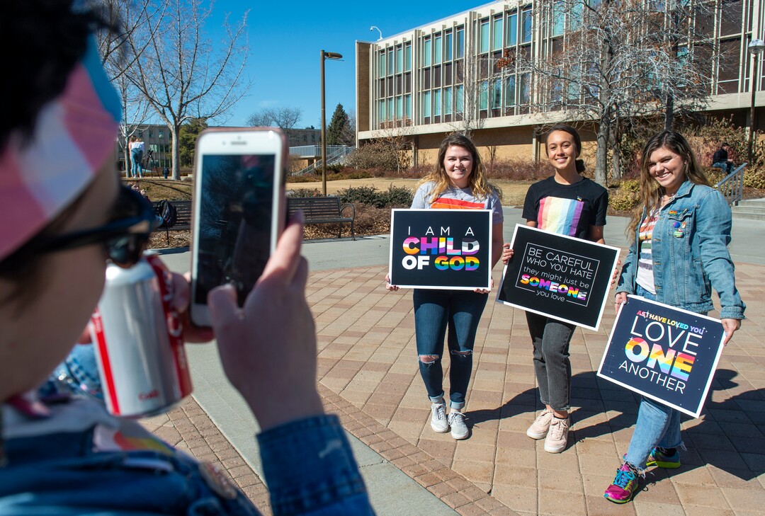 (Rick Egan  |  The Salt Lake Tribune)   Emma Ramirez snaps a photo of Joslyn Empey, Halia Kealoha and Ciera Galbraith as they gather together for Rainbow Day on the BYU Campus, Wednesday, Feb. 26, 2020.
