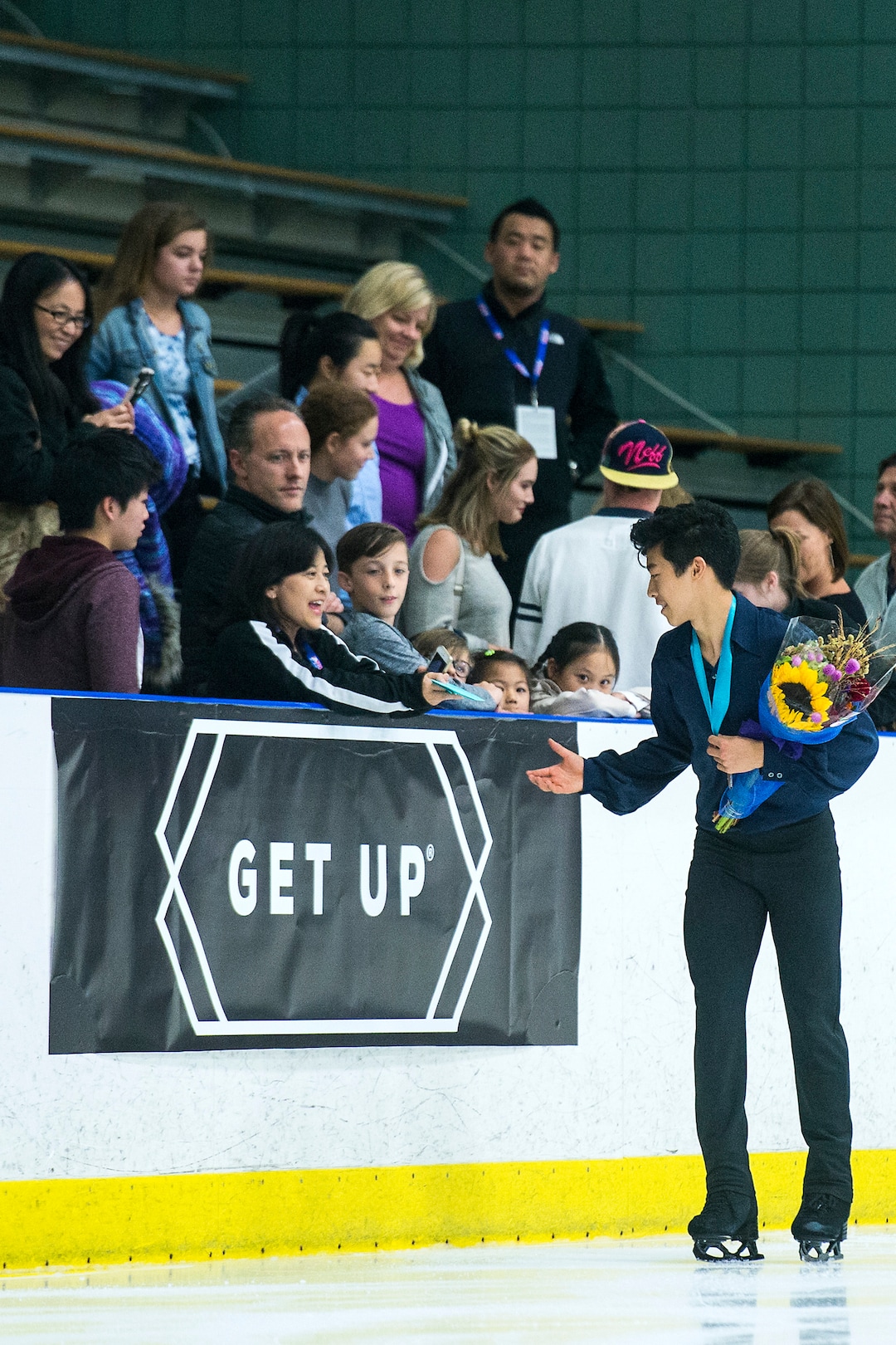 (Chris Detrick  |  The Salt Lake Tribune)   Nathan Chen greets members to the crowd after winning the Men's Free Skate during the U.S. International Figure Skating Classic at the Salt Lake City Sports Complex Friday, September 15, 2017. 