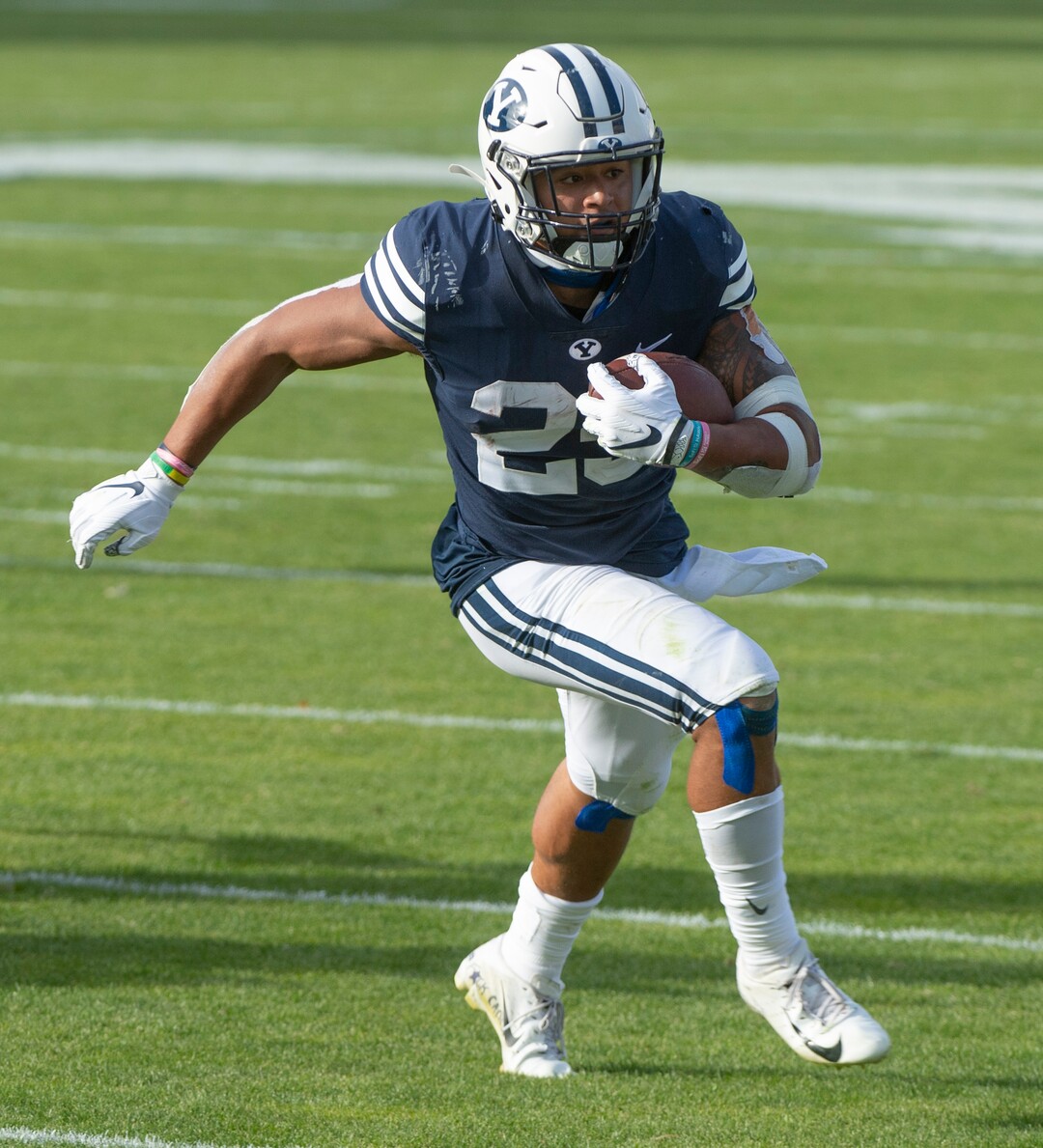 (Rick Egan  |  The Salt Lake Tribune)    Brigham Young running back Tyler Allgeier (25) runs for a Cougar touchdown, in football action between the Brigham Young Cougars and the UTSA Roadrunners, at Lavell Edwards stadium, Saturday, Oct. 10, 2020.
