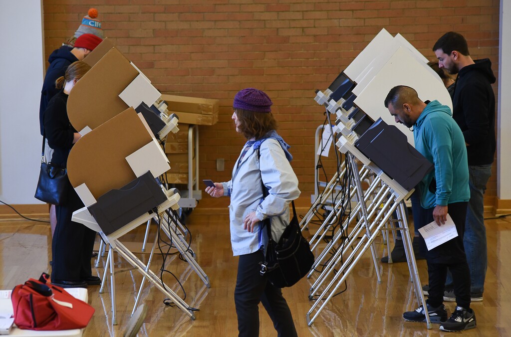 (Francisco Kjolseth  |  Tribune file photo)  People cast their votes in the early hours for the midterm elections on Tuesday, Nov. 6, 2018, at the Columbus Center in Salt Lake City.
