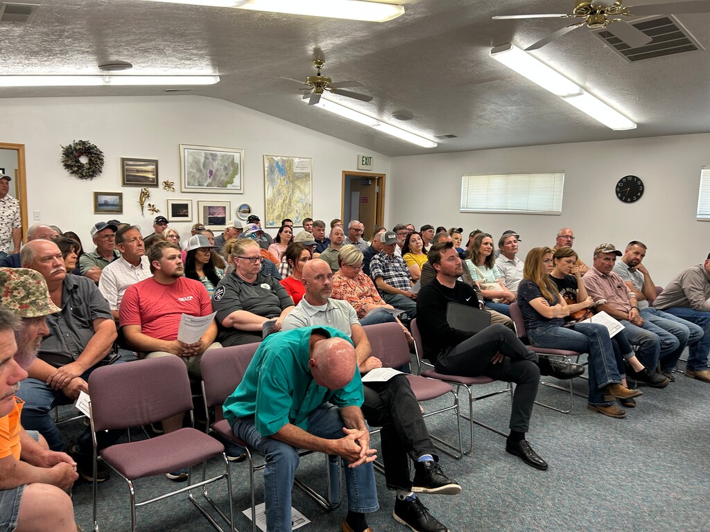(Matt Ward | Millard County Chronicle Progress) The May 28 Millard County planning commission meeting attracted dozens of residents who listened to a public hearing regarding a zone change on 1,143 acres of land for a proposed data center project.
