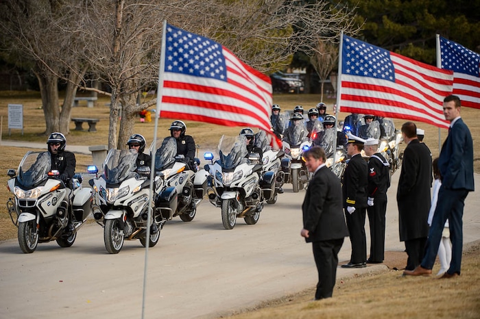 (Trent Nelson | The Salt Lake Tribune)  The Salt Lake City Police Department Motorcycle Squad at the graveside service for Jon Huntsman Sr. at Wasatch Lawn Memorial Park & Mortuary in Salt Lake City, Saturday February 10, 2018.