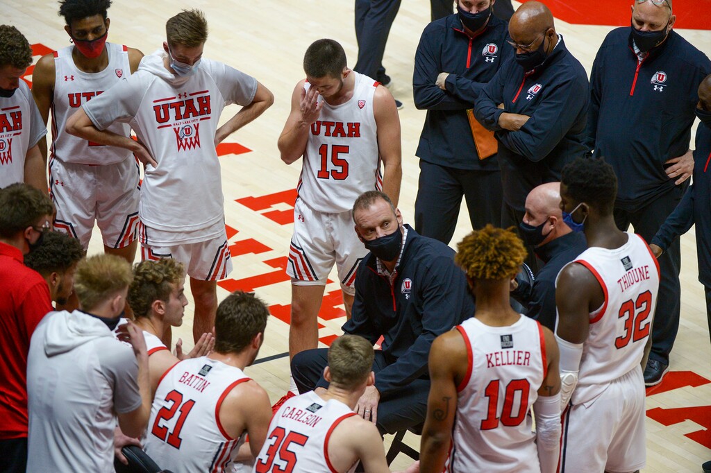 (Leah Hogsten  |  The Salt Lake Tribune) Utah coach Larry Krystkowiak talks to his team during a timeout against Idaho State. The Utes defeated the Bengals 75-59 during their NCAA basketball matchup Tuesday, Dec. 8, 2020 at the Jon M. Huntsman Center.