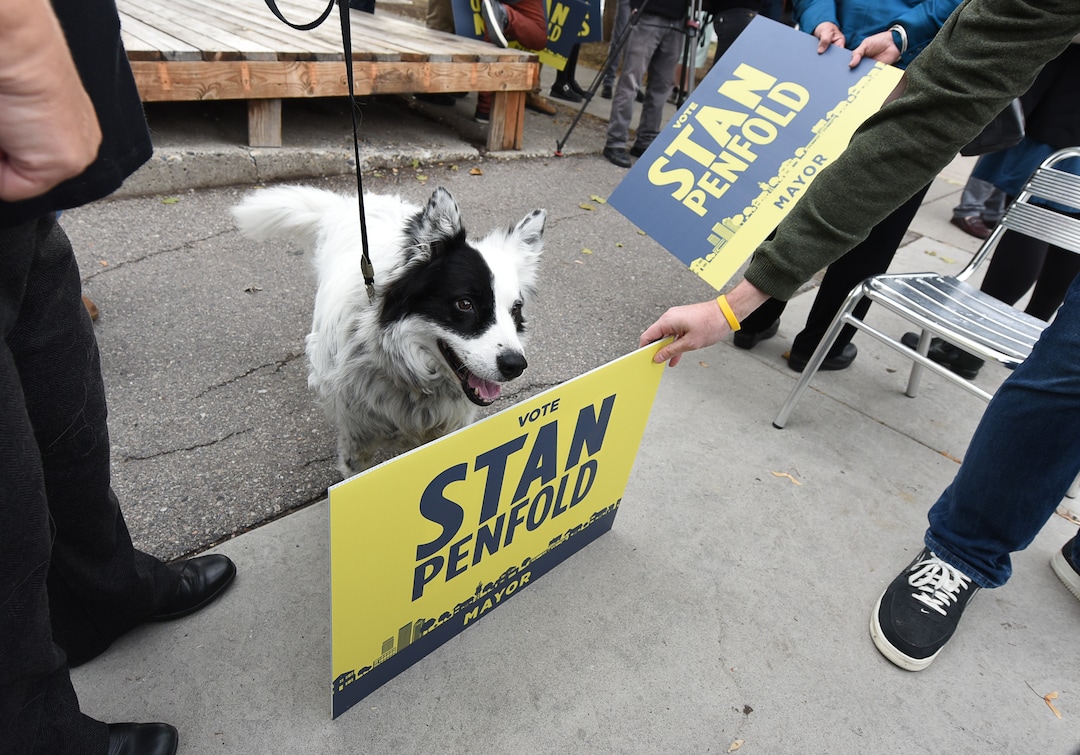 (Francisco Kjolseth  |  The Salt Lake Tribune)  Former Salt Lake City Councilman Stan Penfold's dog Ollie poses for a campaign photographer after his owner announced his bid for mayor surrounded by supporters in the 9th East and 9th South area of Salt Lake City on Thursday, Oct. 4, 2018.