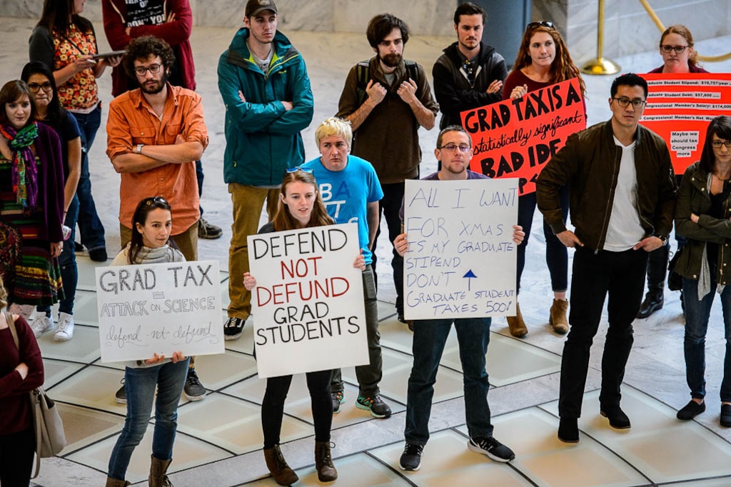 (Trent Nelson | The Salt Lake Tribune)  Graduate students rally at the Utah State Capitol in opposition to a House bill that would tax tuition waivers. Salt Lake City Tuesday November 21, 2017.