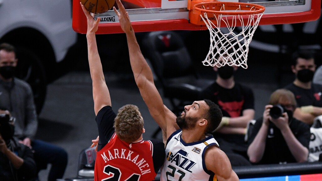 (Paul Beaty | AP) Chicago Bulls' Lauri Markkanen (24) shoots as Utah Jazz's Rudy Gobert (27) defends during the first half of an NBA basketball game Monday, March 22, 2021, in Chicago.