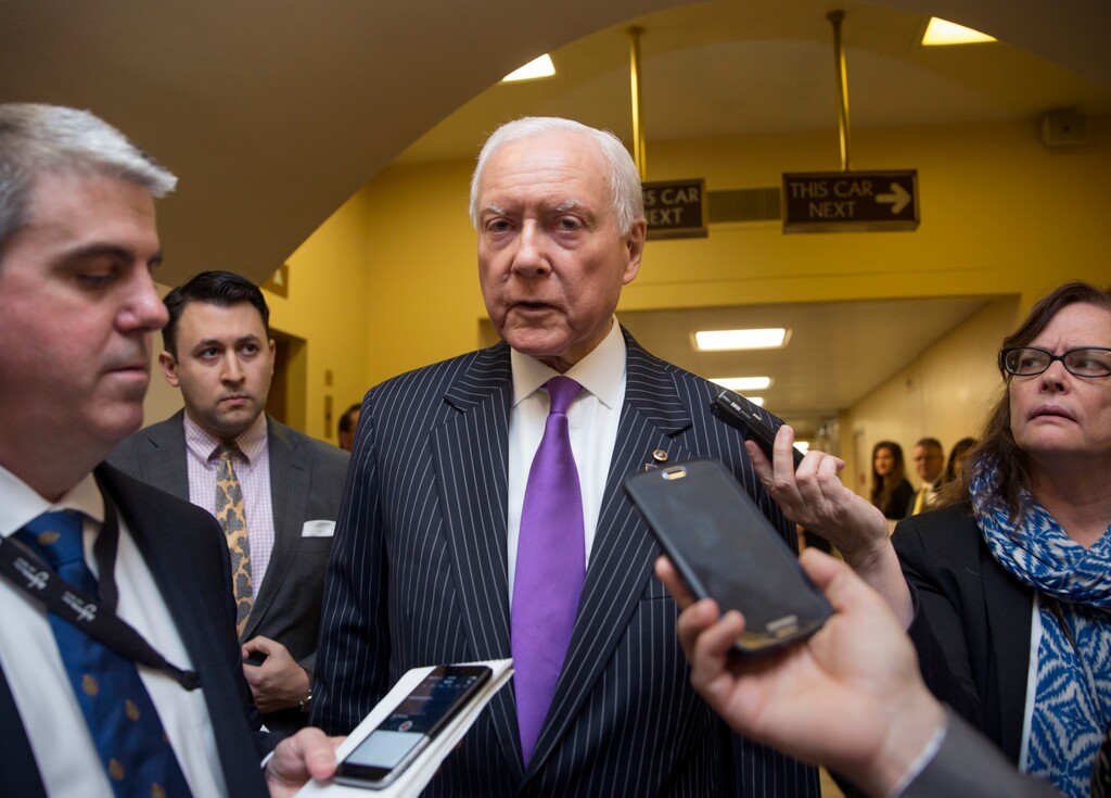 Sen. Orrin Hatch, R-Utah, a senior member of the Senate Judiciary Committee, speaks with reporters in a basement corridor at the Capitol just after President Barack Obama urged Senate Republicans to grant hearings and a confirmation vote to Merrick Garland, his nominee to replace the late Justice Antonin Scalia on the Supreme Court, in Washington, Wednesday, March 16, 2016.  (AP Photo/J. Scott Applewhite)