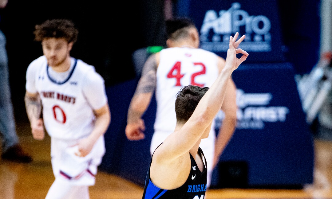 (Isaac Hale | Special to The Tribune) Brigham Young University guard Trevin Knell (21) celebrates his three-pointer during a game between the BYU Cougars and the Saint Mary’s College of California Gaels held at the Marriott Center in Provo on Saturday, Feb. 27, 2021.