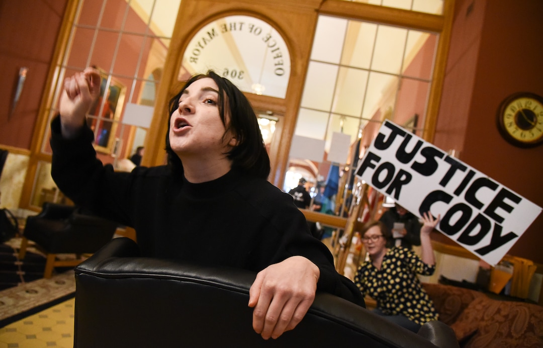(Francisco Kjolseth  |  The Salt Lake Tribune)  Carly Haldeman chants "no justice no peace" as she and a dozen or so others friends of Cody Belgard, organize a sit-in at the office of Mayor Jackie Biskupski in Salt Lake City on Thursday, Jan. 10, 2019, to demand a meeting with the mayor. The group along with members of Utah Against Police Brutality have tried for weeks to get a meeting to discuss the killing of Belgard by Salt Lake City police last November.