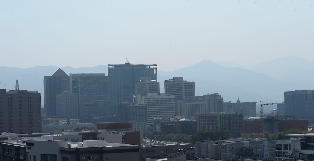 (Al Hartmann  | Tribune file photo) 	Smoke from wildfires burning across the western U.S. is worsening air conditions on the Wasatch Front, as seen Tuesday in downtown Salt Lake City.