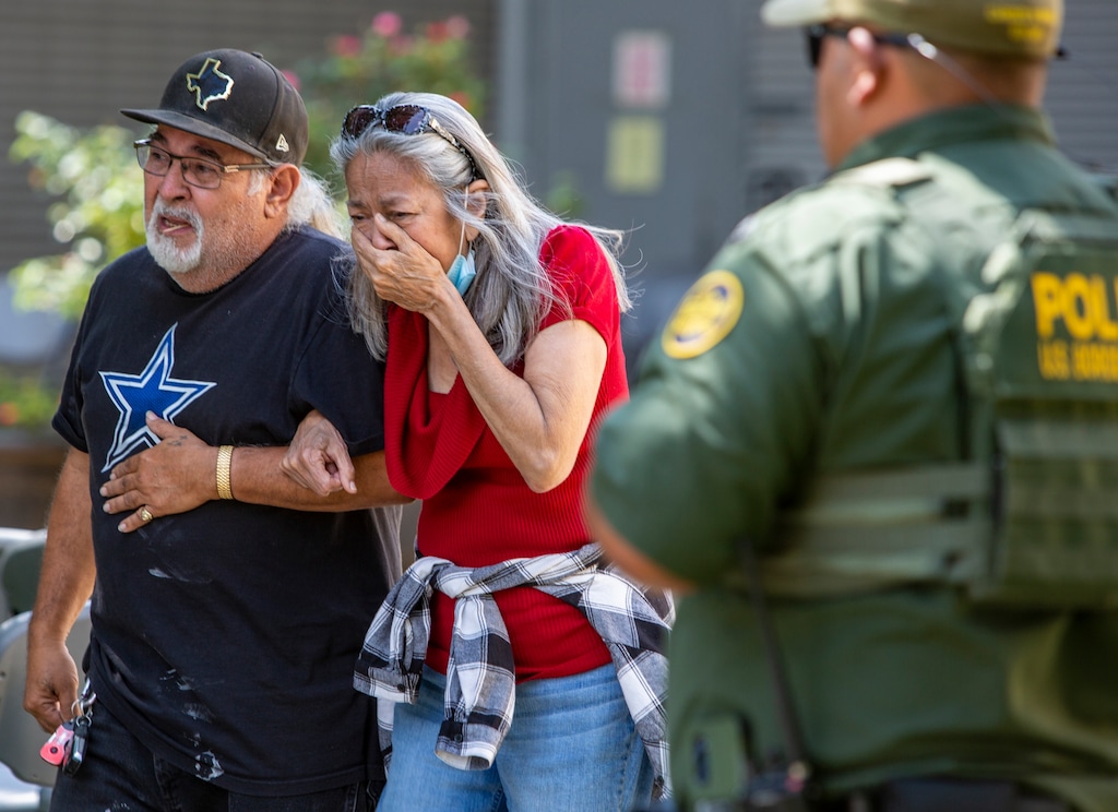 (William Luther | The San Antonio Express-News via AP) A woman cries as she leaves the Uvalde Civic Center, Tuesday May 24, 2022, in Uvalde, Texas An 18-year-old gunman opened fire Tuesday at a Texas elementary school, killing multiple children and a teacher and wounding others, Gov. Greg Abbott said, and the gunman was dead.
