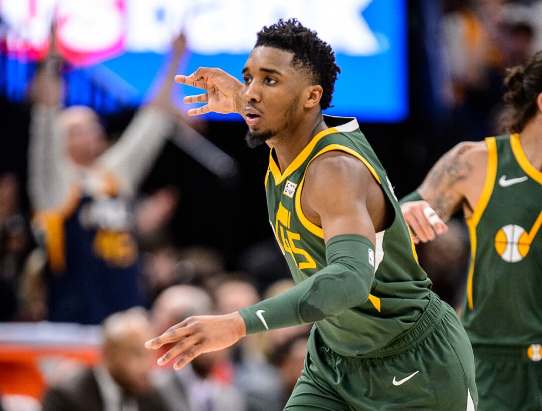(Trent Nelson | The Salt Lake Tribune)  Utah Jazz guard Donovan Mitchell (45) hits a three-pointer as the Utah Jazz host the Milwaukee Bucks, NBA basketball in Salt Lake City on Saturday March 2, 2019.