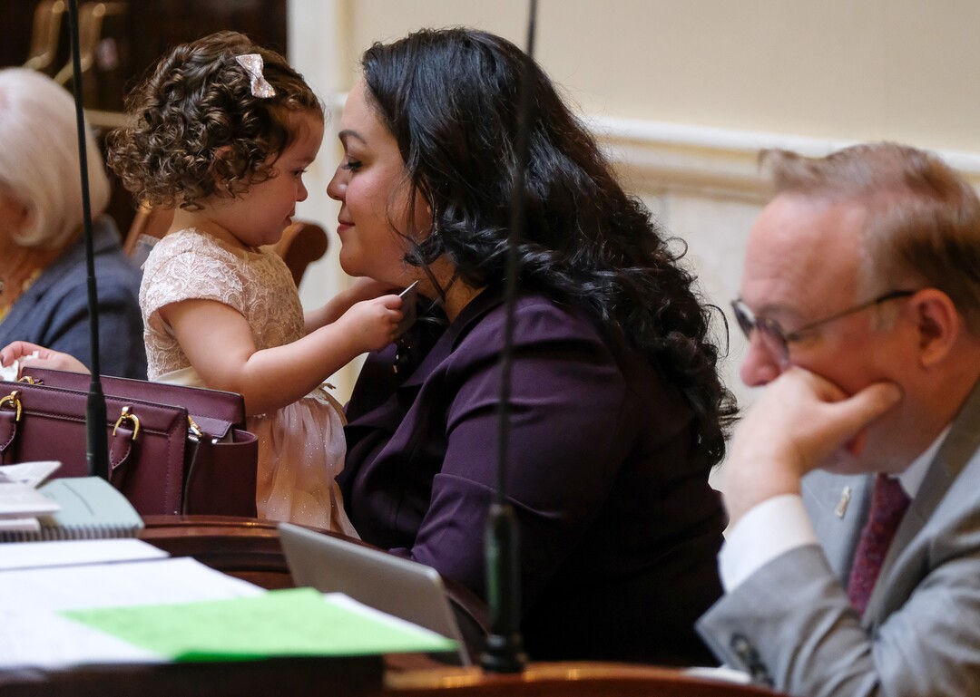 (Francisco Kjolseth  |  The Salt Lake Tribune)  Senator Luz Escamilla is joined by her daughter Sofia, 21-months, on the senate floor for the opening of the 2018 legislative session at the Utah Capitol on Monday, Jan. 22, 2018.