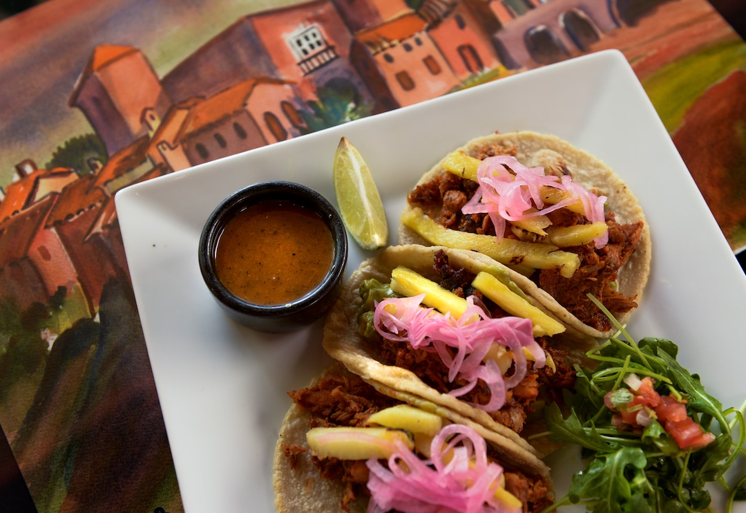 (Leah Hogsten  |  The Salt Lake Tribune)  Al pastor (pork) tacos with grilled pineapple and pickled onion are among the new items served at Rico Cocina y Tequila Bar, formerly Frida Bistro.