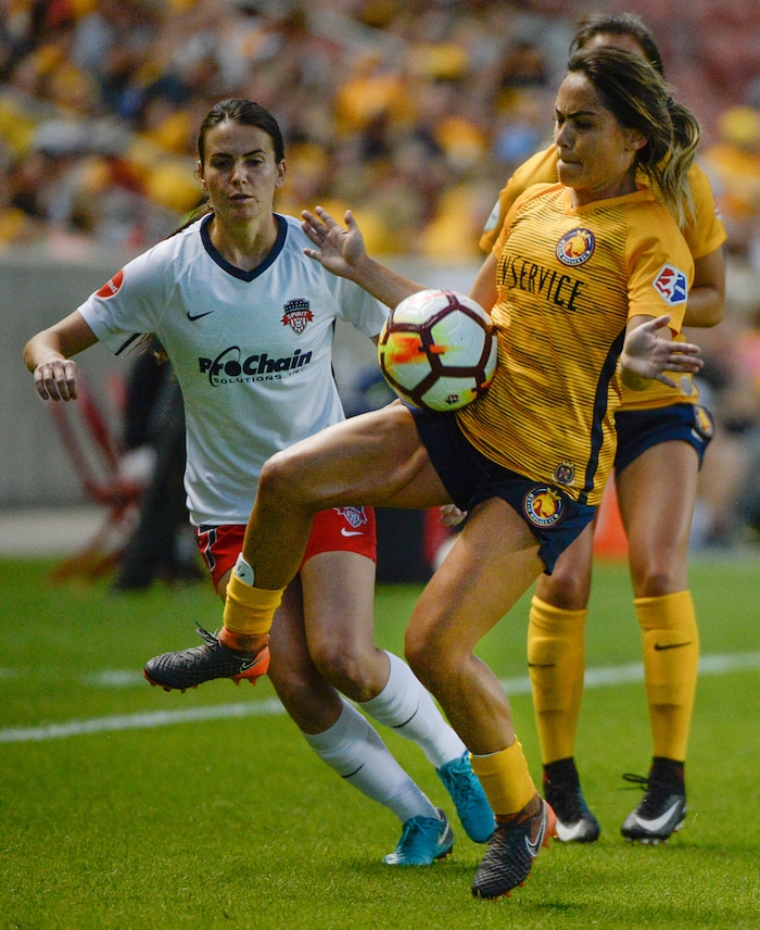 (Francisco Kjolseth  |  The Salt Lake Tribune)  Utah Royals FC hosts Washington Spirit, NWSL soccer at Rio Tinto Stadium in Sandy, Wed. Aug. 8, 2018. Utah Royals FC midfielder Lo'eau LaBonta (9) tries to regain control of the ball during a downfield drive. 
