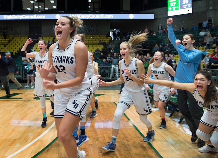 Scott Sommerdorf | The Salt Lake TribuneSalem Hills' Lauren Gustin, #12, leads her team in celebrating their 57-35 win over Hurricane for the 4A girl's title, Saturday, March 3, 2018. Gustin finished the game with 32 points and dominated in the win.