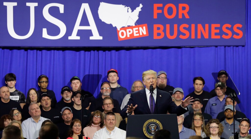 FILE- In this Feb. 5, 2017, file photo, President Donald Trump delivers remarks at Sheffer Corp. to promote his tax policy in Blue Ash, Ohio. Trump’s federal tax overhaul is a short-term boon for most states, but one is set to miss out entirely: Oregon. Instead of a bonus, Oregon faces a loss of $217 million in the two years after the overhaul goes into effect, the largest of any state that has revealed its predictions. (AP Photo/Evan Vucci, File)