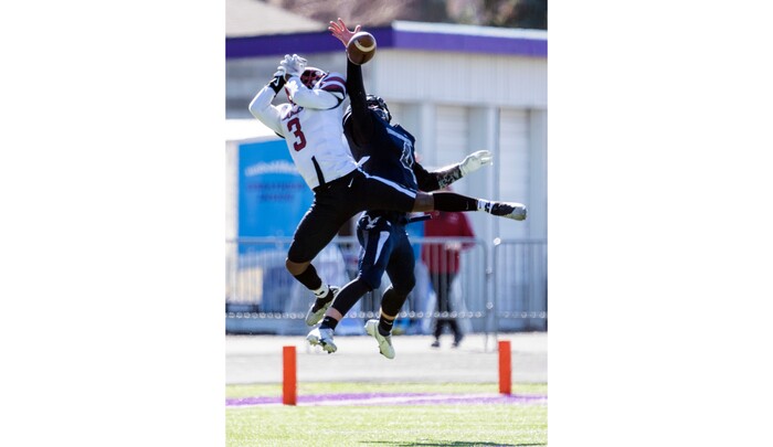 (Rick Egan | The Salt Lake Tribune) Layton Christian Academy wide receiver Malik Johnson goes up for a pass along with Duchesne Eagle, Draker Goodliffe (4), in 1A Football Championship action between the Duchesne Eagles and the Layton Christian Academy Eagles, at the Elizabeth Dee Shaw Stewart Stadium in Ogden, on Saturday, Nov. 13, 2021.