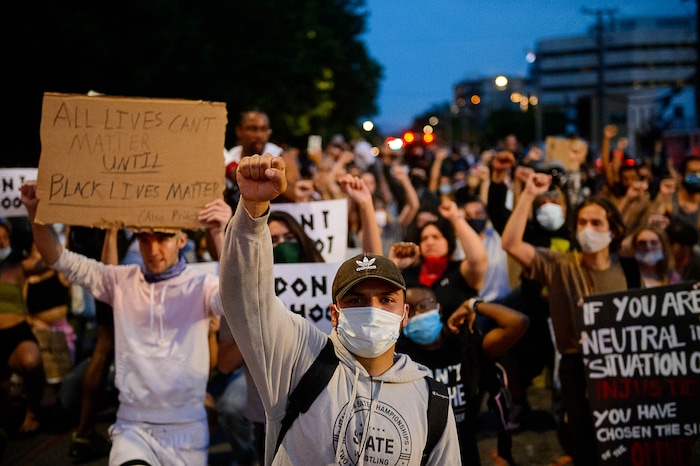 (Trent Nelson  |  The Salt Lake Tribune) Protesters march through Salt Lake City on Monday, June 1, 2020.