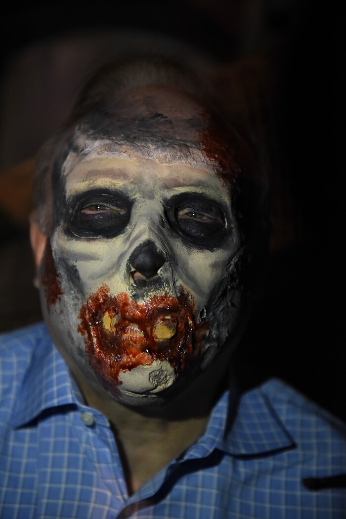 (Francisco Kjolseth  |  The Salt Lake Tribune)  State Senators Jim Dabakis is transformed by makeup artist Anne Nichols as local politicians fall prey to the zombie apocalypse at the Fear Factory on Thursday, Oct. 12, 2017, for a special event to raise awareness of the Utah Food Bank and kick start donations. 