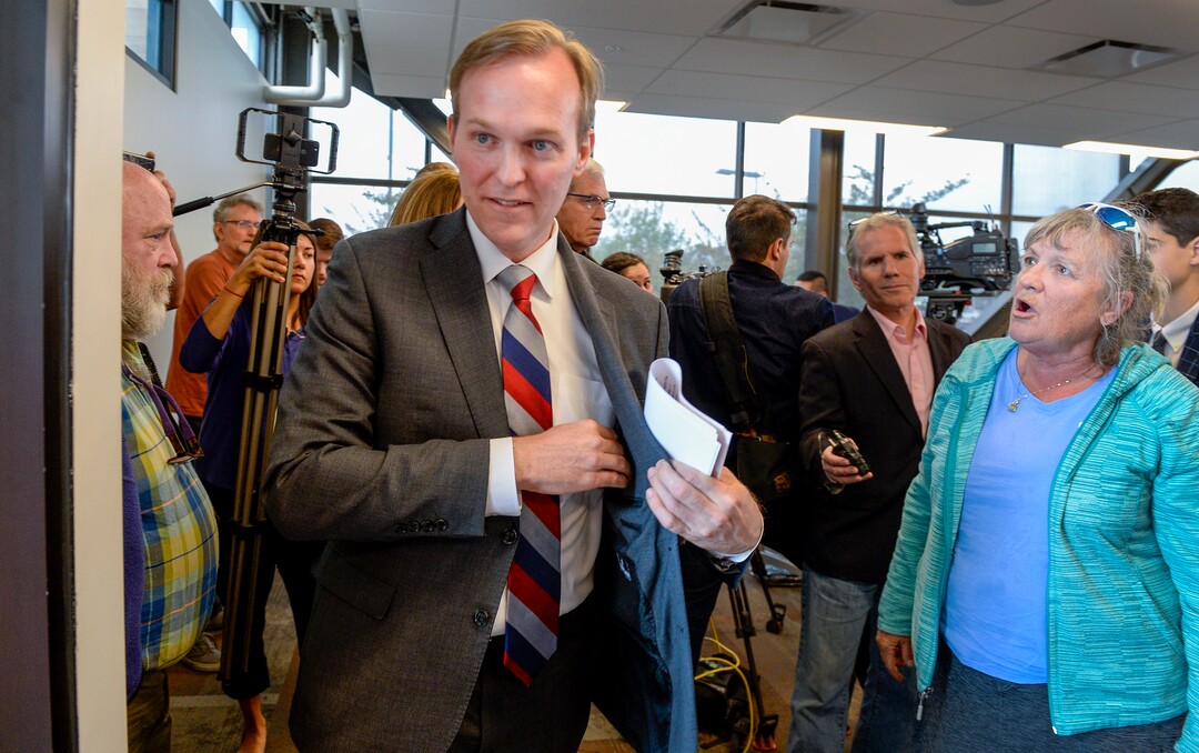 (Leah Hogsten  |  The Salt Lake Tribune)  Sandy resident Jamie Zayach, right, pressured Rep. Ben McAdams on whether he would vote in support of impeaching the president Friday at a scheduled health and wellness town hall at the Midvale Senior Center. ÒHe is straddling the fence and I think heÕs concerned about re-election,Ó said Zayach. ÒI think he needs to take a stand.Ó Rep. Ben McAdams on Friday said that while he will not prejudge the outcome of the impeachment inquiry into President Donald Trump, a formal probe is necessary to determine the facts.