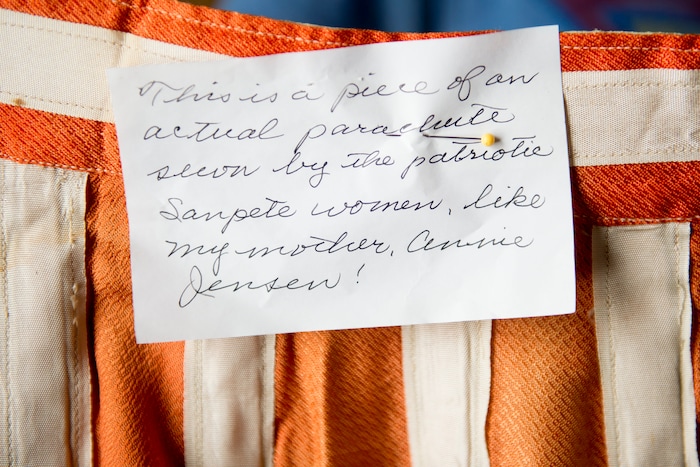 (Jeremy Harmon | The Salt Lake Tribune) A note describing the patriotic women of Sanpete County, Utah, is seen on a skirt made out of parachute silk. Items like it were made during and after the war in part because parachute factories in Manti led to Utahns having access to silk and nylon used to make the chutes.