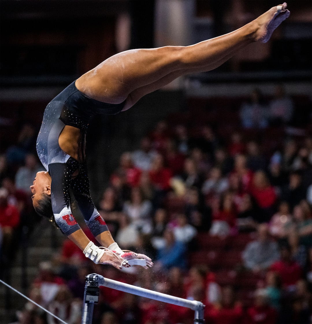 (Rick Egan | The Salt Lake Tribune)  f Amelie Morgan performs on the bars for Utah, during a meet between Utah, LSU, Oklahoma and UCLA at the Maverik Center, on Saturday, Jan. 13, 2024.