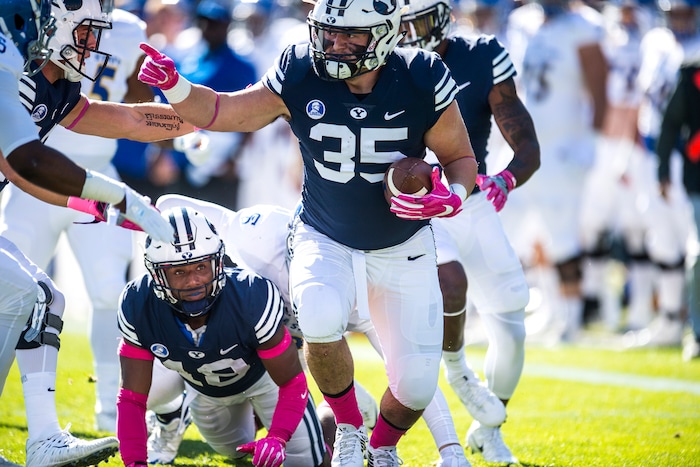 (Chris Detrick  |  The Salt Lake Tribune)  Brigham Young Cougars running back Brayden El-Bakri (35) recovers the ball after tackling San Jose State Spartans wide receiver Rahshead Johnson (8) on the opening kick-off during the game at LaVell Edwards Stadium Saturday, October 28, 2017.  