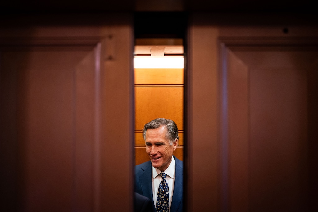 (Kent Nishimura | The New York Times) Sen. Mitt Romney, R-Utah, departs after speaking to reporters outside the Senate Chamber at the Capitol in Washington on Monday, Sept. 11, 2023.