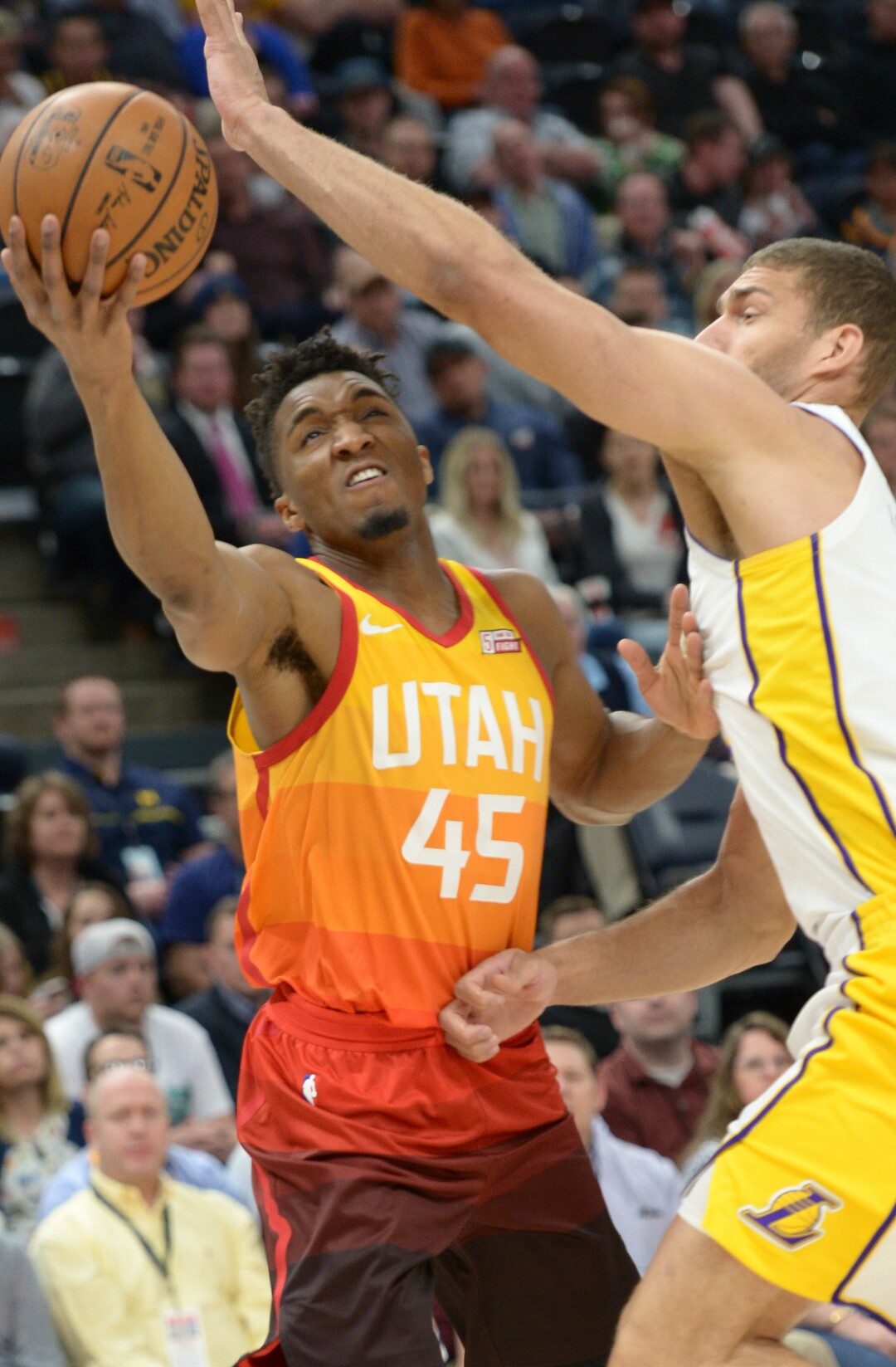 (Leah Hogsten  |  The Salt Lake Tribune)  Los Angeles Lakers center Brook Lopez (11) pressures Utah Jazz guard Donovan Mitchell (45) as the Utah Jazz host the Los Angeles Lakers at Vivint Smart Home Arena Tuesday, April 3, 2018