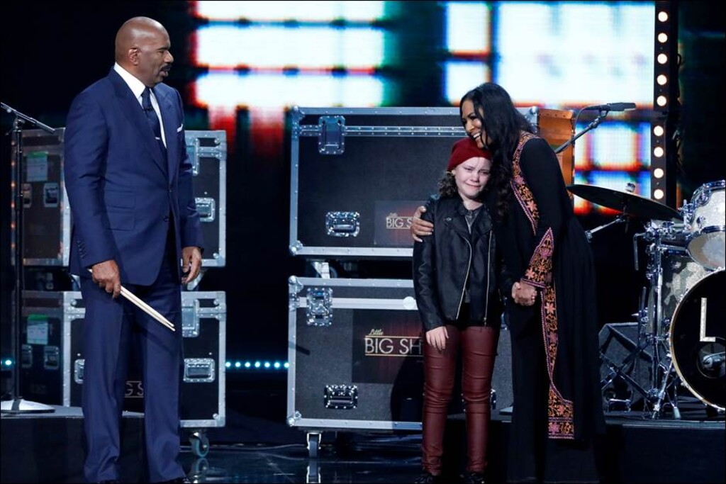 (Photo by: Evans Vestal Ward/NBC) “Little Big Shots” host Steve Harvey, 10-year-old Utah drummer Milana Nigro and Sheila E.