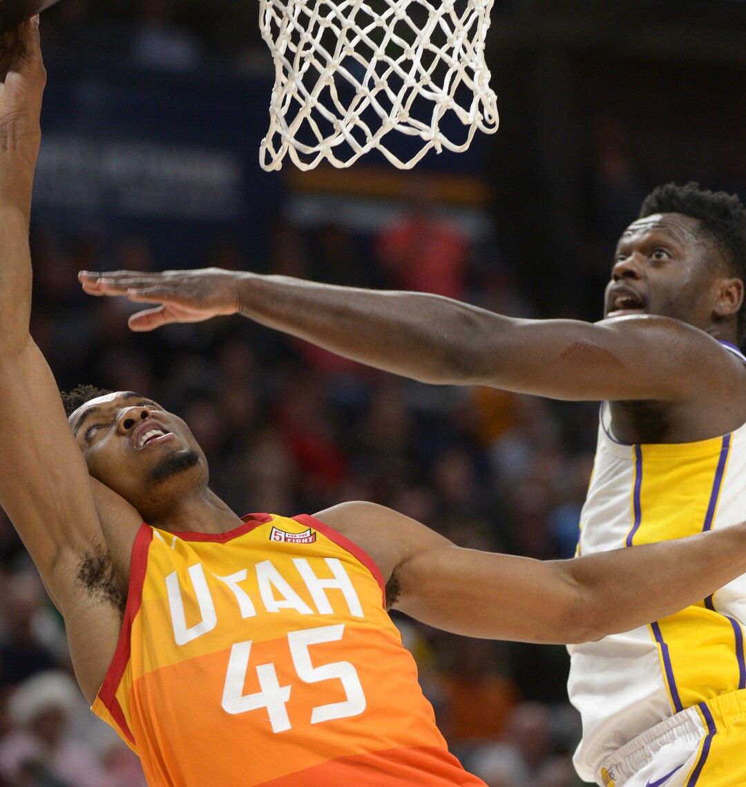 (Leah Hogsten  |  The Salt Lake Tribune)  Utah Jazz guard Donovan Mitchell (45) drives to the net as the Utah Jazz host the Los Angeles Lakers at Vivint Smart Home Arena Tuesday, April 3, 2018