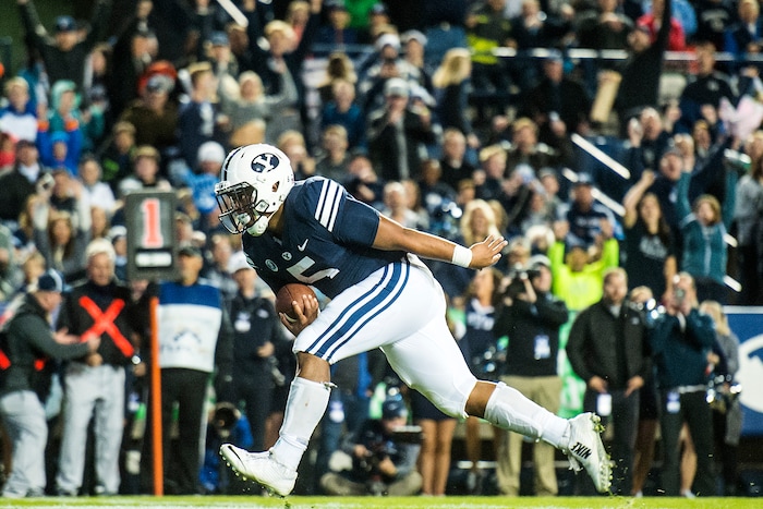(Chris Detrick  |  The Salt Lake Tribune)  Brigham Young Cougars running back Ula Tolutau (5) scores a touchdown during the game LaVell Edwards Stadium Friday, October 6, 2017. 